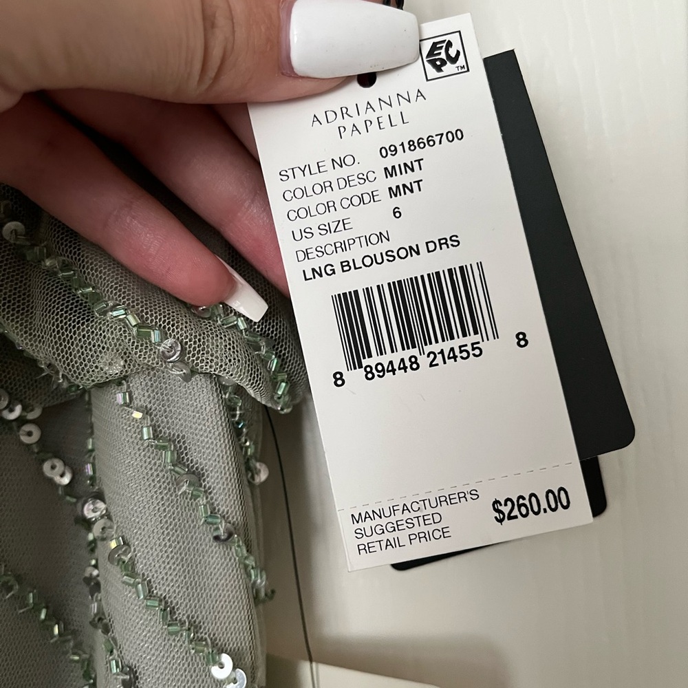 Never worn Adrianna Papell Beaded Gown
Tags attached
Size 6
Color mint - Picture 7 of 7